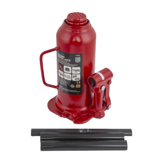 Red hydraulic bottle jack with two black oil bottles on a white background