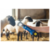 a person holding the Aesculap Cordless shearing machine for sheep & Dirty Cattle (NOVA)