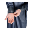 Person wearing a dark blue satin robe with hands extended