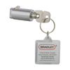 Metal lock cylinder with key and key tag on a white background, featuring the Bradley brand.