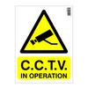 CCTV in operation warning sign with yellow background and black text