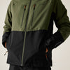 Two-tone green and black jacket with zippers on a white background