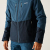 Two-tone blue jacket with a visible brand logo on a light gray background