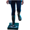 A person wearing dark teal rubber rain boots and dark leggings steps into a green rectangular cleaning tray filled with soapy water, shown against a plain white background.
