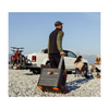 person carrying the Jackery Explorer 2000 Plus Portable Power Station