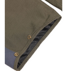 Close-up detail of a garment sleeve or cuff in olive green fabric, showing a metal snap button, black mesh trim, and a blue-gray inner lining on a white background.