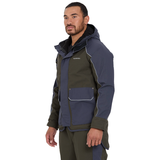 Man wearing a two-tone jacket with green and navy on a white background