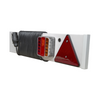 Trailer light with red reflector and wiring on a white background