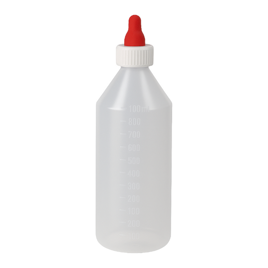 Clear plastic bottle with a red cap on a white background