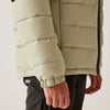 Close-up of a beige puffer jacket with brand logo on a white background