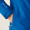 Close-up of a blue jacket with a brand logo on a light gray background