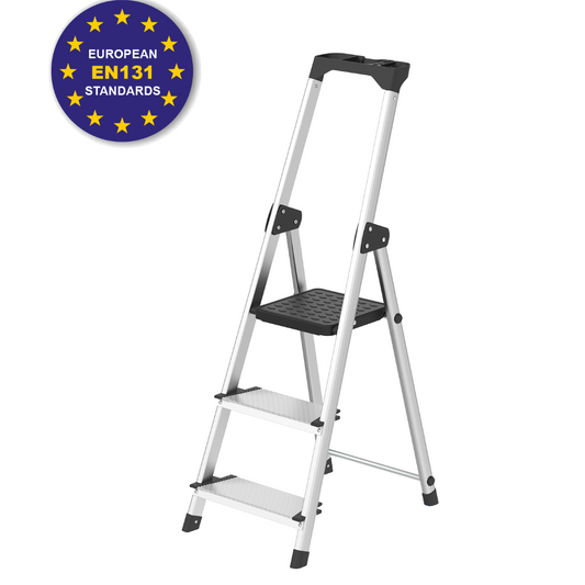 A three-step aluminum step ladder with black plastic feet, handgrip, and textured non-slip steps, shown on a white background with a circular 'European EN131 Standards' badge in the top-left corner.