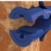 A close-up of a blue plastic mechanical component or clip mounted against a textured tan and brown background.
