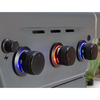 Control knobs with illuminated indicators on a gray appliance