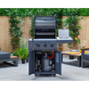 Portable barbecue grill on wheels with open door in an outdoor setting