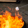 Marshmallow being roasted over an open flame