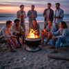 Group of people around a fire pit on a beach at sunset