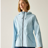 A woman wearing a light blue hooded rain jacket with a black front zipper, shown against a plain light beige studio background.