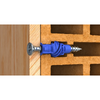 silver screw with blue universal plug through wooden wall and brick