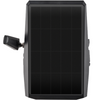 A black rectangular solar panel with a grid pattern on its front which is the top view of the vosker camera, shown against a plain white background with a mounting bracket visible on the left side.