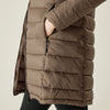 Brown puffer jacket on a beige background