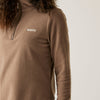 Brown fleece pullover with a logo on the chest against a neutral background