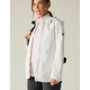 woman wearing white jacket with pink fleece underneath, carrying black backpack