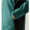 Close-up of a teal and black jacket with a side pocket, showing a hand in the pocket and a hook-and-loop closure detail on the sleeve.