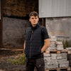 lifestyle view of the Xpert Pro Panelled Bodywarmer in black